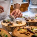 Image of a chef preparing food at a fine dining restaurant.